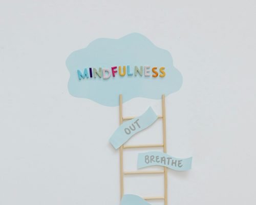 Minimalist artwork depicting mindfulness concept with a ladder and cloud on a white background.